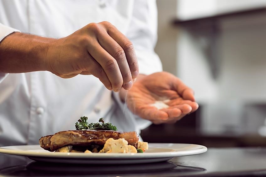 msg sprinkled on umami food at restaurant